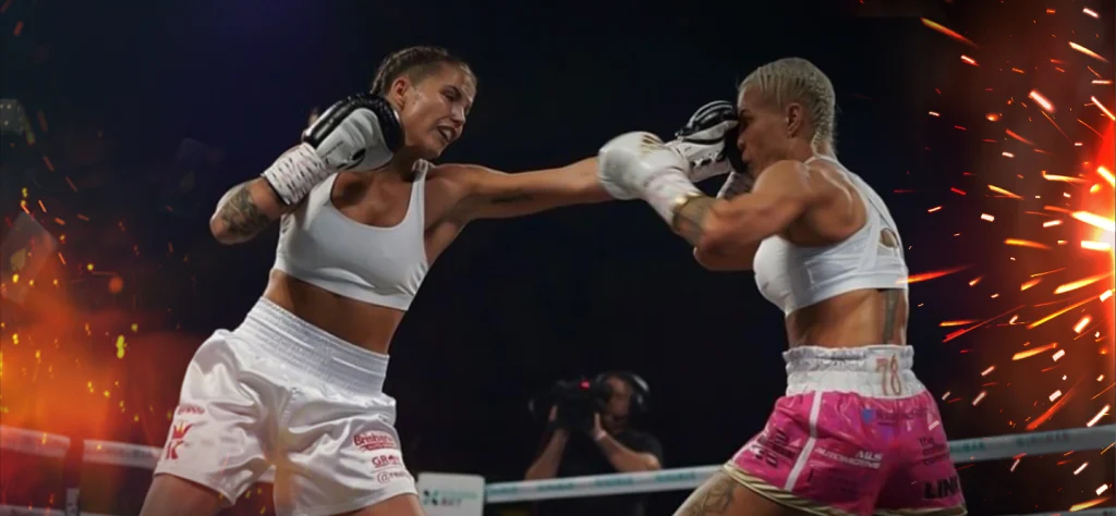 Taylah Robertson hitting her opponent in the face in the boxing ring.