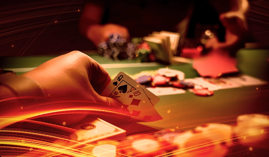 POV shot of a man playing poker at a poker table. A man faces him, and we can see chips, cards and money on the table.