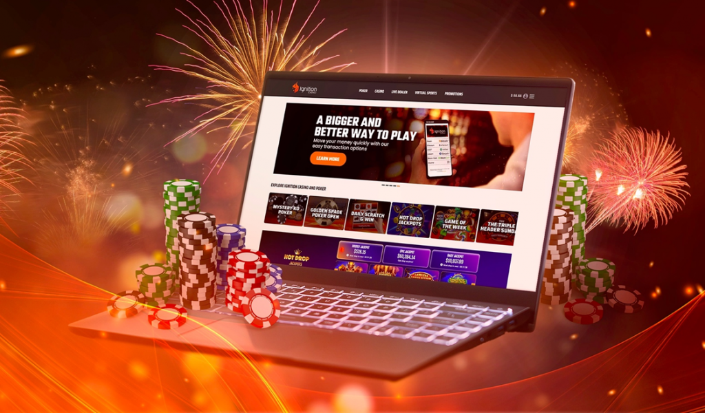 Ignition Casino homepage is displayed on a laptop surrounded by poker chips and vibrant fireworks in a celebratory atmosphere.